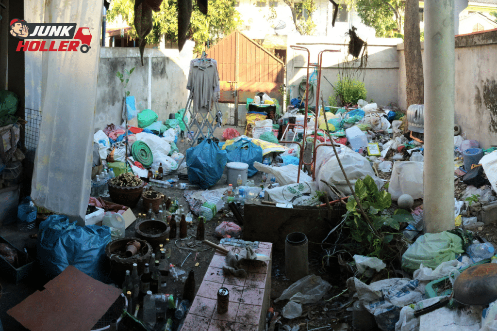 Cluttered yard filled with miscellaneous items in need of professional hoarding cleanup in Meridian, Idaho.
