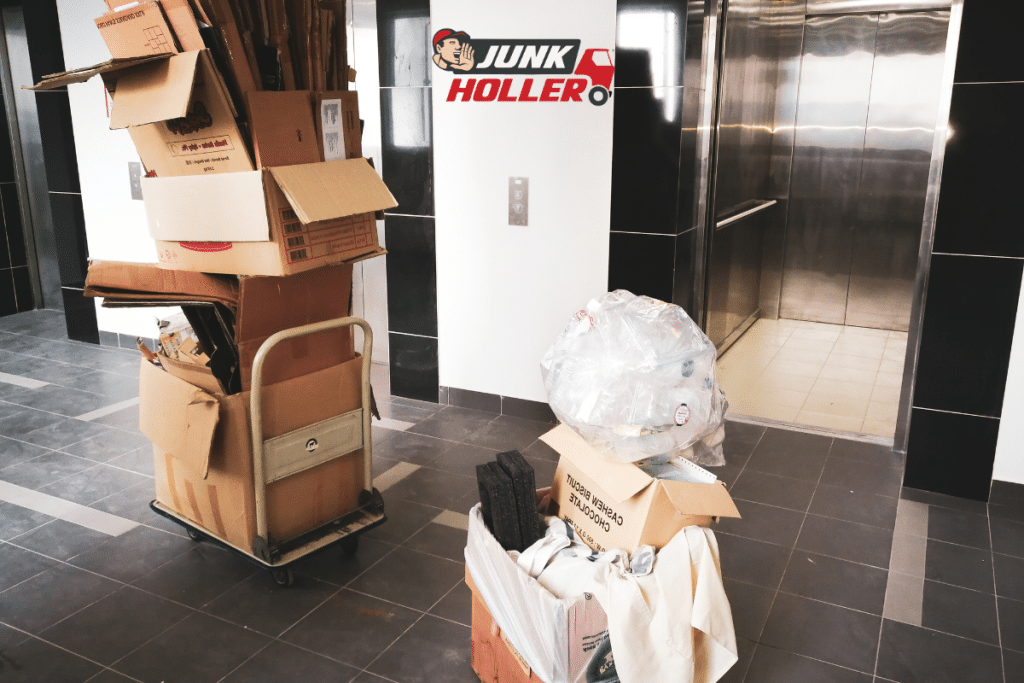 Junk in boxes ready for removal during moving out process in Boise, Idaho.