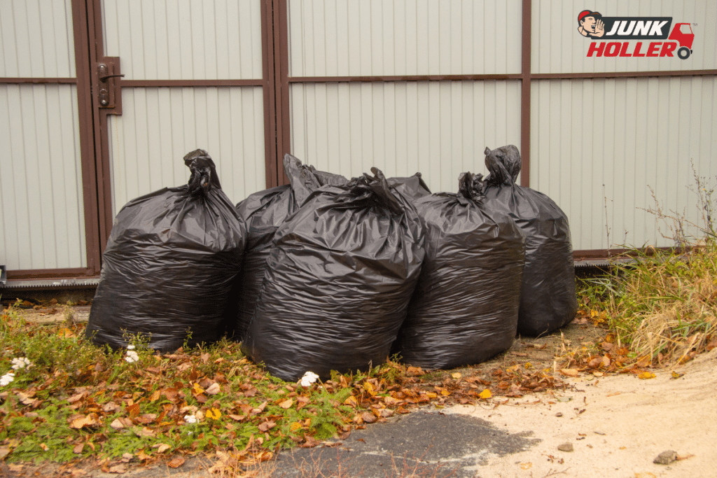 Yard debris collected into trash bags ready for removal in Boise, Idaho.