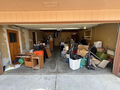 Open garage in Eagle, ID with junk about to be picked up by Junk Holler.